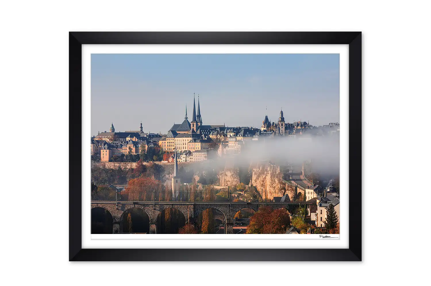 Luxembourg skyline cityscape in autumn foggy morning framed print
